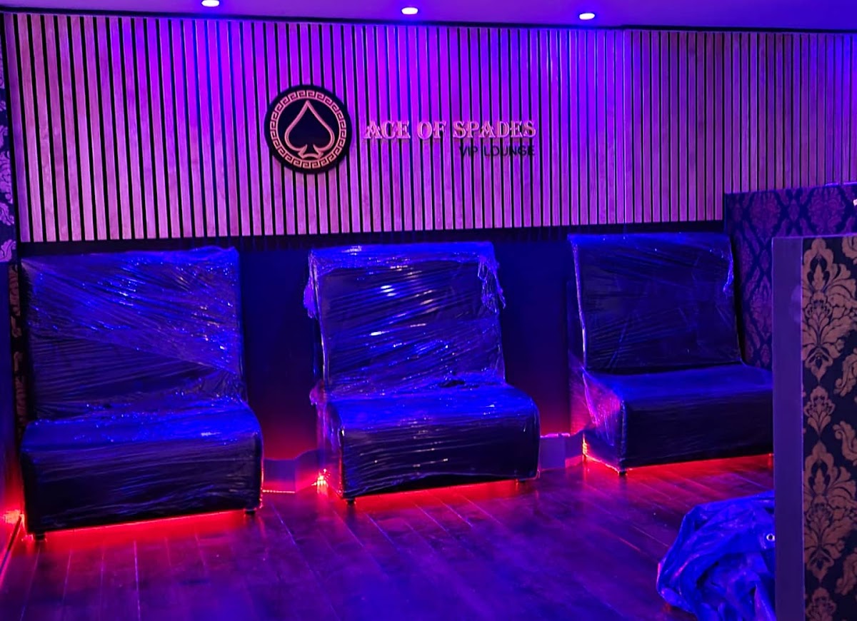 Venue lounge with coloured LED strip and floor accent lighting