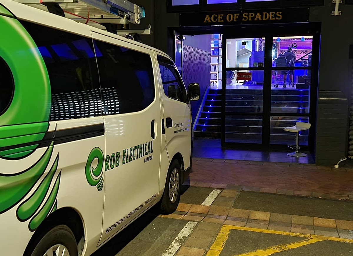 Rob Tiatia Electrical van parked at a commercial job at night