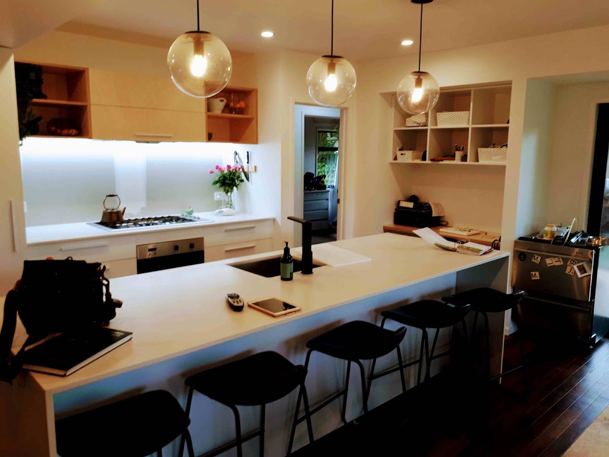 Modern kitchen with glass pendant lights installed by Rob Tiatia Electrical